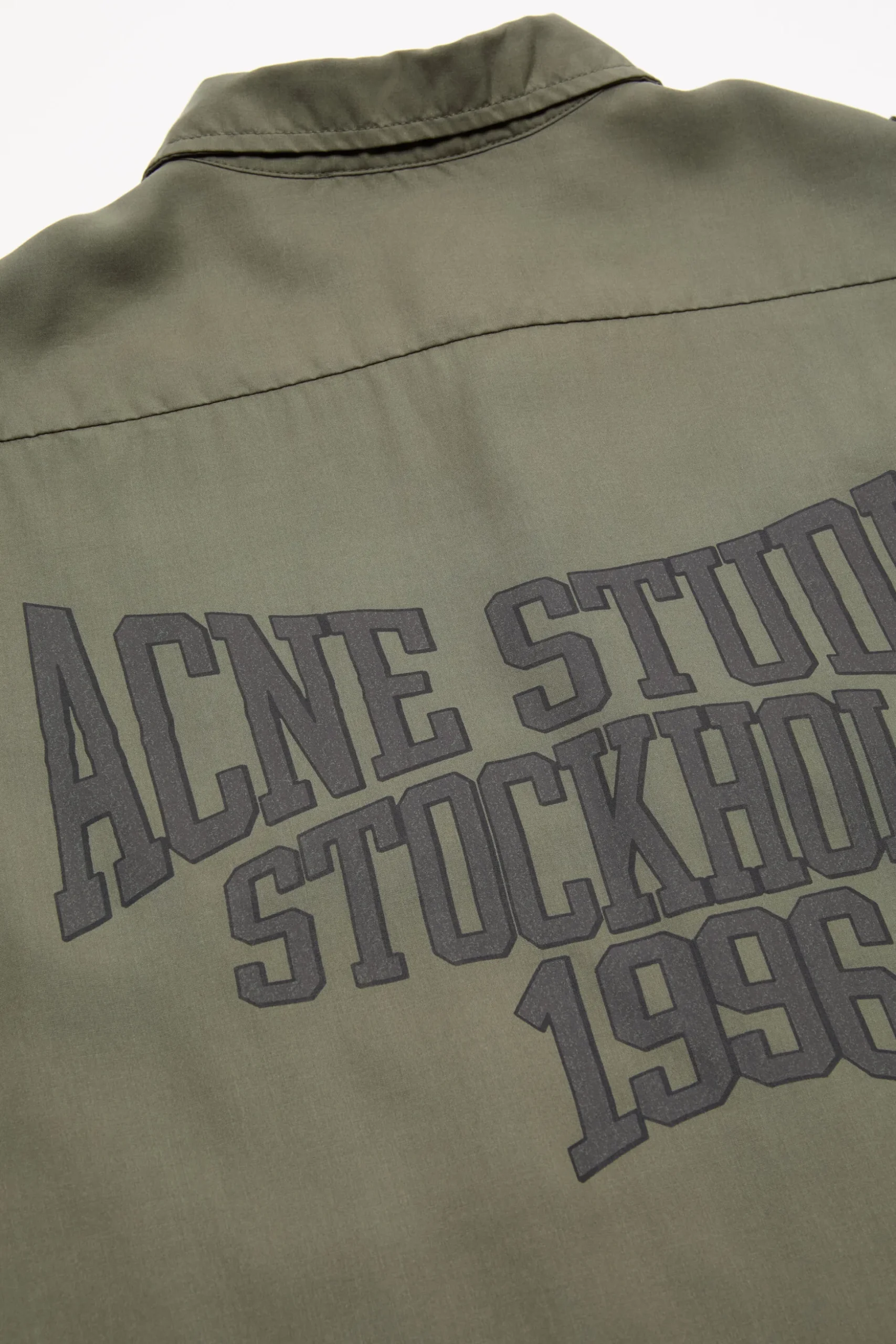 Button-up shirt with logo