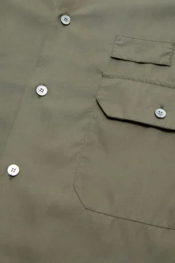 Button-up shirt with logo