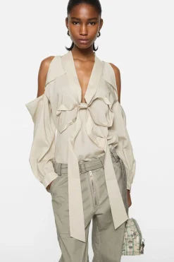 Cut-out blouse with bow