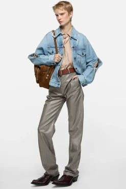 Distressed denim jacket
