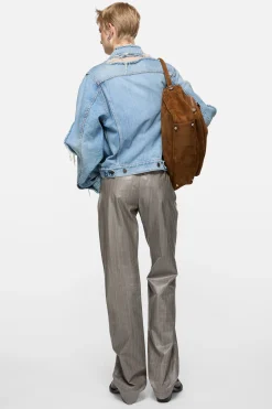 Distressed denim jacket