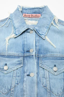 Distressed denim jacket