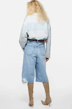 Distressed denim shorts