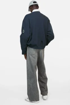 Distressed fleece sweatshirt