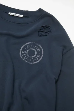 Distressed fleece sweatshirt