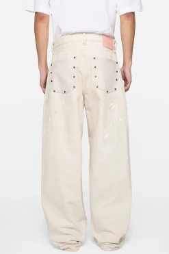 Loose fit jeans with leather pockets