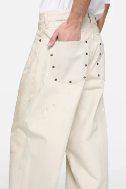 Loose fit jeans with leather pockets