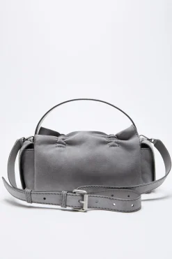 Multipocket suede shoulder bag