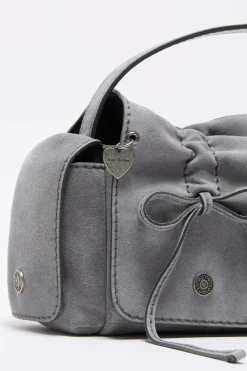Multipocket suede shoulder bag